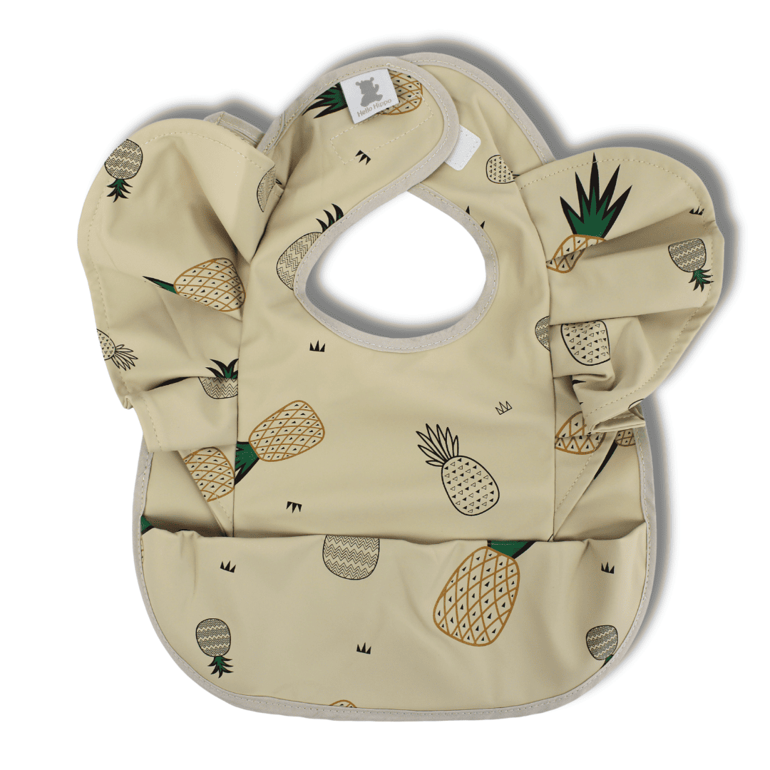 Babero impermeable con volantes y bolsillo recogemigas