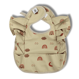 Babero impermeable con volantes y bolsillo recogemigas